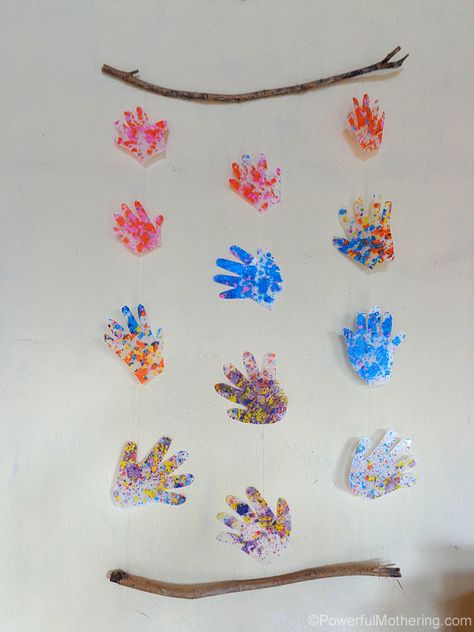 Also makes a great gift for grandparents, AND small and cheap for postage! <3 - http://www.powerfulmothering.com/hand-print-wall-hanging/ Hand Print Wall, Flower Wall Hanging Decor, Room Hanging Decor, Diy Paper Wall Hanging, Wall Hanging Ideas, Spiral Art, Flower Wall Hanging, Hanging Ideas, Paper Wall Hanging