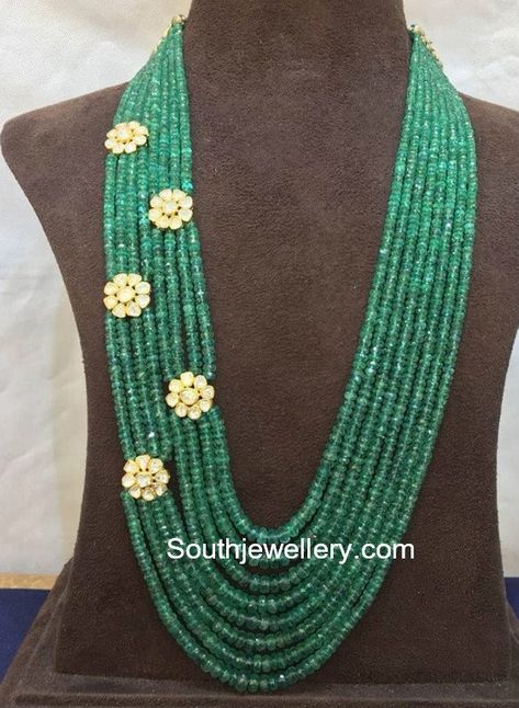 Multi string emerald beads mala with floral side brooches studded with uncut diamonds by Amarsons Pearls Beads Side Pendant, Beads Mala Designs, Green Beads Indian Jewellery, Pacchala Haram, Emerald Beads Mala, Beads Indian Jewellery, Navratan Jewellery, Jadtar Set, Arm Belt