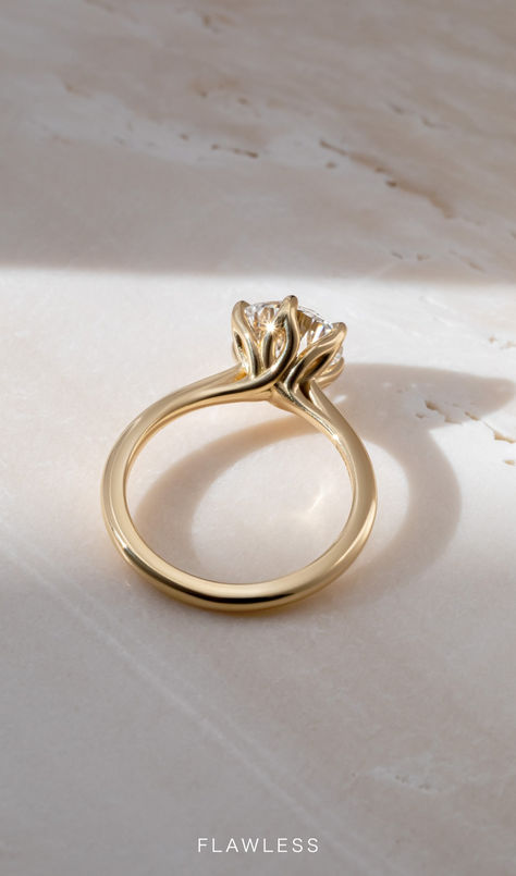 This simple claw prong solitaire features an open basket with six elegant leaves that delicately cradle the center diamond. Unique Solitaire Engagement Ring, Yellow Gold Solitaire Engagement Ring, Gold Solitaire Engagement Ring, Yellow Gold Engagement Ring, Yellow Gold Solitaire, Round Solitaire, Claw Prong, Yellow Gold Engagement Rings, Solitaire Engagement