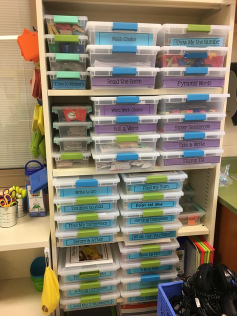 Organization of center manipulatives! The purple labels represent phonics centers and the blue labels represent math centers. Math Manipulative Storage, Manipulative Storage, Tk Classroom, 2024 Classroom, Math Manipulative, Bedroom Organizer, Tara West, Prek Activities, Teacher Vibes