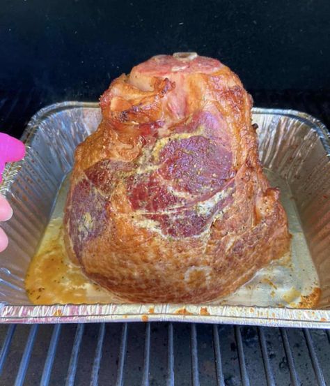 This Double Smoked Spiral Ham, aka Twice Smoked Ham, is smoked on a Traeger Pellet Grill to absolute perfection. It is then coated in a sweet pineapple glaze for the perfect Holiday main dish! Traeger Ham, Ham On Pellet Grill, Traeger Smoked Ham, Smoked Ham With Pineapple, Spiral Ham On Smoker, Double Smoked Ham On Pellet Grill, Smoked Spiral Ham On Pellet Grill, Smoked Spiral Ham Traeger, Pineapple Glaze For Ham