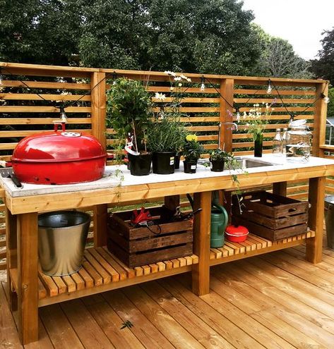 a relaxed rustic bbq zone of wood and concrete, with many potted herbs and a grill plus open storage space Outdoor Barbeque Area, Barbeque Area, Outdoor Grill Station, Outdoor Barbeque, Outdoor Kitchen Decor, Outdoor Kitchen Plans, Outdoor Bbq Kitchen, Outdoor Kitchen Design Layout, Backyard Kitchen