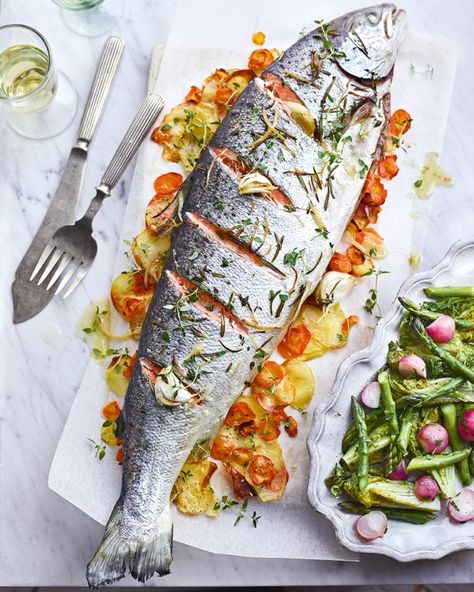 Whole roast salmon with spring vegetables recipe | delicious. magazine Four Magazine Recipes, Whole Salmon Recipes, Whole Salmon Recipe, Christmas Salmon, Roasted Salmon Recipes, Roast Salmon, Spring Vegetables Recipes, Easy Salmon Recipe, Mushroom Wine Sauce