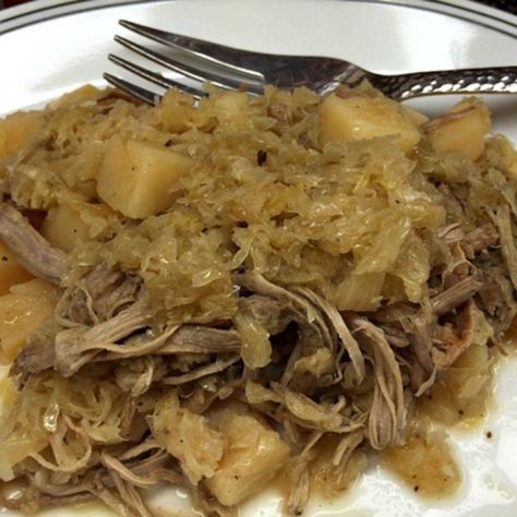 Slow Cooker Pork and Sauerkraut | "Super-easy slow cooked pork tenderloin with sauerkraut and potatoes. Use a slow cooker liner for effortless cleanup." #recipe #foodholiday Crock Pot Pork And Sauerkraut Recipe, Slow Cooker Pork And Sauerkraut Recipe, Crockpot Pork And Sauerkraut, Kimchi Food, Pork And Sauerkraut Recipe, Pork Roast And Sauerkraut, Pork Chops And Sauerkraut, Pork And Sauerkraut, Crock Pot Pork