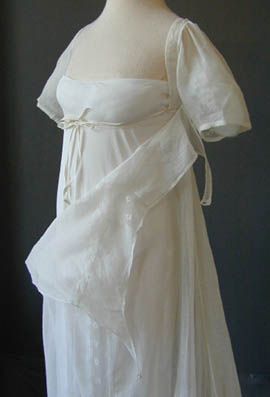 White muslin wedding dress (showing fall-front bodice construction and underdress), English, c. 1805-11. There is a hand written note in ink with this item: "India muslin wedding dress with neckline insertion, worn by my grandmother Hon Jane Elizabeth Wain?, daughter of Lord Headley of Agador, Co Kerry (Ireland) 1811. Lived at Lea Castle, Simmonsbath, Exmoor. Died in Rome." It also says "Wolverley House, Jersey." They probably had two residences. Plus Size Bridal Dresses, Mermaid Ball Gown, Wedding Bridal Dress, Coquette Fashion, White Ball Gowns, White Mermaid, Regency Dress, Regency Fashion, 사진 촬영 포즈