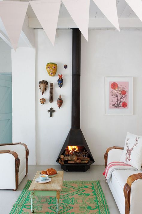 Interesting wood stoves we'd love to cozy up to – Cottage Life Wood Stove Decor, Stove Decor, Deco House, Casa Country, Freestanding Fireplace, Green Colour Palette, Wood Burner, Wood Burning Stove, A Living Room