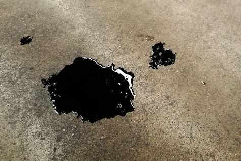 Oil stains on concrete seem like a lost cause, but these cleaners really work—as long as you're willing to scrub a little. Remove Grease Stain, Toilet Cleaning Hacks, Remove Oil Stains, Hard Water Stain Remover, Wd 40, Grease Stains, Diy Cleaning Hacks, Hard Water Stains, Paint Remover