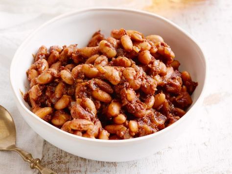 Recipe of the Day: Giada De Laurentiis' Italian-Style Baked Beans Elevate canned cannellini beans to cookout-worthy heights by cooking them down with dark beer, brown sugar, balsamic vinegar and molasses until rich and sticky in the oven." Bbq Side Dish Recipes, Baked Bean Recipes, Bbq Sides, Side Dishes For Bbq, Giada De Laurentiis, Cooking Channel, Top Recipes, Veggie Sides, Baked Beans