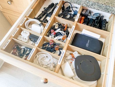 Electronic cords and other tech items organized in a drawer with vertical and horizontal drawer dividers Tech Drawer, Drawer Inspiration, Kitchen Utensil Drawer, Junk Drawer Organizing, Silverware Drawer, Drawer Labels, Drawer Bins, Utensil Drawer, Drawer Organization