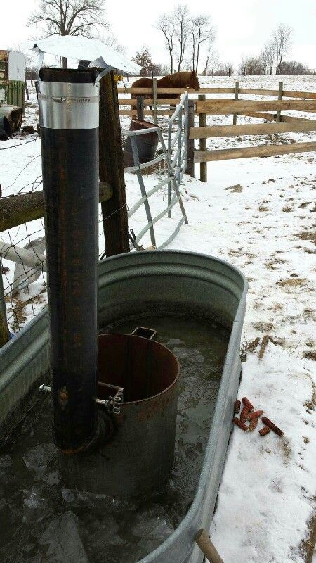 Wood fired stock tank heater for horses Horse Mineral Feeder, Horse Water Trough Winter, Diy Water Tank, Stock Tank Heater, Farm Goals, Cattle Corrals, Cow Barn, Diy Stock Tank, Livestock Barn