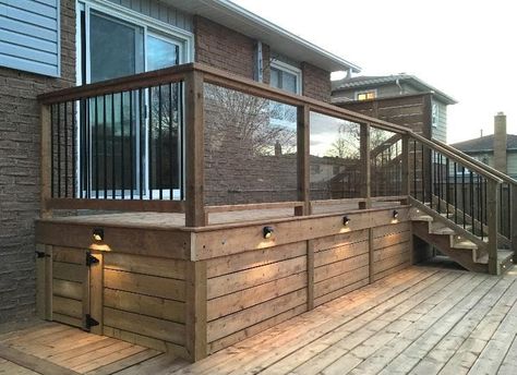 35+ Easy & Inexpensive Deck Skirting Ideas and Designs (2021) Multiple Level Deck Ideas, Gray House With Deck, Wood Underpinning, Bilevel Deck, Front Deck Ideas Entrance Porch Designs, Shed Under Deck, Deck Lattice, Porch Skirting, Small Decks