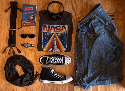 80’s vintage style men’s fashion flat lay grid. Excellent, stylish look brings classic vintage vibes together with the right blend of class meets cool. Converse, denim jacket, and retro NASA shirt take this outfit out of this world! Nasa Shirt Aesthetic, Nasa Outfit Men, Marvel Shirt Outfit, Nasa Jacket Outfit, Nasa Shirt Outfit, Nasa Aesthetic Outfit, Nasa Outfit Aesthetic, 80s Denim Jacket Outfit, Nasa Outfit