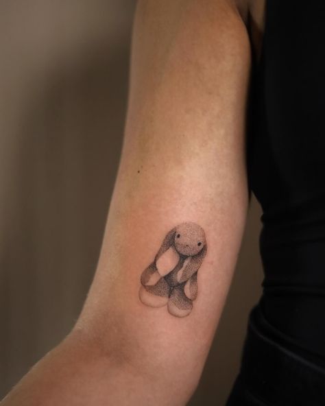 Maxime Dubbeld - Tattooed this little cutie last week. Thanks Meia for trusting me to tattoo your stuffed animal that has been with you since you can remember. And still going strong 😁❤️ . . . . #stuffedanimaltattoo #animaltattoo #rabittattoo #cutetatoo #smalltattoo #subtletattoo #dotworktattoo #childhoodtattoo #zwolletattoo #tattoo zwolle Stuffed Animal Tattoo, Trust Tattoo, Bunny Stuffed Animal, Hand Poke, Dot Work Tattoo, Subtle Tattoos, Line Tattoos, Tattoo You, Cute Tattoos