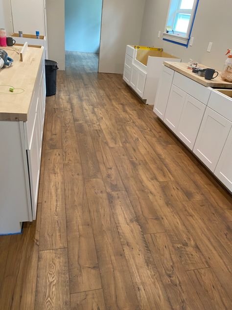 Pergo Waterproof Laminate Flooring Colors, Laminate Flooring That Looks Like Real Wood, Pergo Laminate Flooring Basement, Lifeproof Rustic Wood Vinyl Flooring, Vienna Oak Pergo Flooring, Pergo Amber Chestnut Laminate, Sun Veiled Oak Pergo, Elk Lodge Oak Pergo, Hoboken Oak Pergo