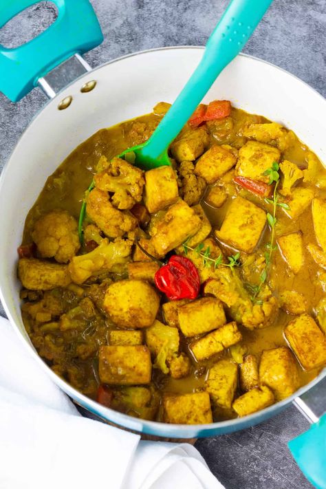 Curry Tofu With Cauliflower Tofu Cauliflower, Curry Tofu, Sauteed Tofu, Vegan Curry Recipes, Steamed Cabbage, Tofu Curry, Jamaican Dishes, Cauliflower Dishes, Vegan Entree