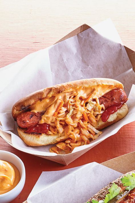 When it comes to topping hot dogs, why should ketchup or mustard be all there is to choose from? turn up the fun with a Kimchi Dog. Swap sauerkraut for spicy kimchi — it’s just perfect for people who crave Korean flavor and heat. Spicy Korean Ramen, Korean Salmon, Kimchi Mayo, Homemade Kimchi, Spicy Kimchi, Cucumber Kimchi, Spicy Ketchup, Chili Dogs, Crowd Pleasing Recipes