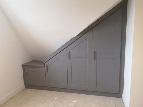 Built In Wardrobe Ideas Loft, Wardrobe Design Slanted Roof, Angled Ceiling Built Ins, Loft Wardrobe Ideas Slanted Ceiling, Angled Roof Bedroom Ideas, Angled Roof Bedroom, Loft Wardrobe Ideas, Bedroom Ideas Angled Ceilings, Loft Conversion Ensuite