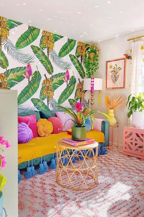 Tropical Gallery Wall, Pink Poinsettia, Tropical Living Room, Wonderful Wednesday, Tinsel Tree, Living Room Decor Inspiration, Brush Trees, Icicle Lights, Bold Wallpaper