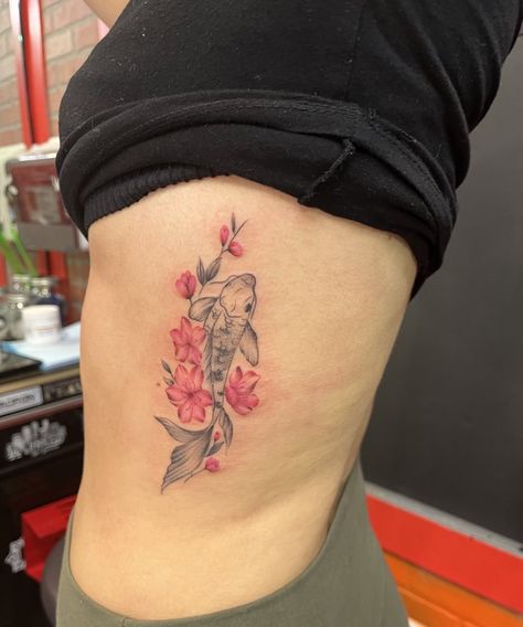 Coi Fish Cherry Blossom Tattoo, Coi Fish With Flowers Tattoo, Coy Fish Arm Tattoo, Koi And Sakura Tattoo, Koi Rib Tattoo, Koi Fish Tattoo On Thigh, Koi Fish And Cherry Blossom Tattoo, Cherry Blossom Koi Fish Tattoo, Koi Fish Tattoo Design For Women