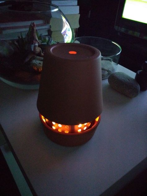 A mini heater from IKEA terracotta pots and candles. Terracotta Heater, Diy Candle Heater, Terra Cotta Heater, Candle Heater, Diy Heater, Room Heater, Terracotta Plant Pots, Ikea Hackers, Portable Heater