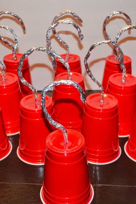 Want to make your own pirate hooks from cups and tin foil? Just grab some paper cups, tin foil, tape, and string! #PirateCrafts #Preschool #DIY Pirate Snacks Preschool, Pirate Hook Craft, Pirate Crafts For Preschoolers, Diy Pirate Decorations, Pirate Themed Crafts, Peter Pan Crafts, Pirate Crafts Preschool, Pirate Snacks, Projects For Preschool