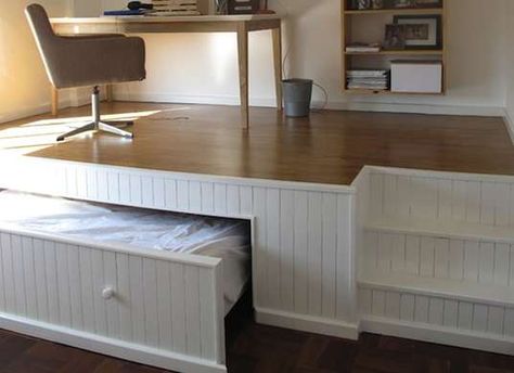 This home office has a secret bed underneath the raised floor—genius idea for a guest room Små Rum Lidt Plads, Hidden Bed, Diy Casa, Hemma Diy, Bilik Tidur, Bed Plans, Compact Living, Tiny Spaces, Hus Inspiration