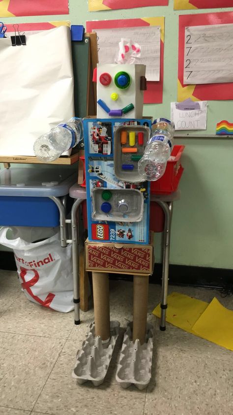 Our class robot made with recyclables! Make A Robot Out Of Recycled Items, Cool Recycled Projects, Recycled Crafts Robot, Robot Made Out Of Recycled Materials, Recycled Robot Craft, Robot Diy Recycle, Recycle Robot Project Ideas, Diy Robot From Recycled Material, Earth Day Recycle Projects