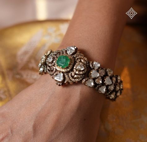 A timeless piece of jewellery that will never go out of style. This Victorian bangle, crafted with delicate green emeralds and valanda, is a testament to the artistry of our craftsmen. The intricate design and sparkling gemstones create a captivating piece that will elevate your wrist. WhatsApp 9964641869 for enquiries. 📍Visit the Blue CKC&Co. Flagship store, near Safina Plaza. Look for the DIAMOND logo! #HeritageJewellery #IndianJewellery #FestiveSeason #Diwali #FestiveAttire #IndianJewe... Simple Jewellery, Victorian Jewellery, Diamond Logo, Heritage Jewellery, Fancy Jewellery Designs, Indian Jewellery Design Earrings, Indian Jewellery Design, Bangles Jewelry Designs, Jewelry Design Earrings