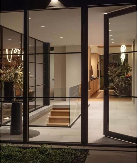 A bold pool house design that is giving off main house vibes. The pitched ceiling and natural wood offset by bold black marble are feeling very rock n’ roll. Let us know below in the poll if you’re feeling it or passing on it. Design @lucasoliverdesign Architecture @smirosarchitects Photos @durstonsaylor Marble @abcstone Rug @fayettestudio Styled Entryway, Pool House Design, Pitched Ceiling, Road House, House Vibes, Hallway Decor, Hallway Table, Entryway Hallway, Abstract Line Art