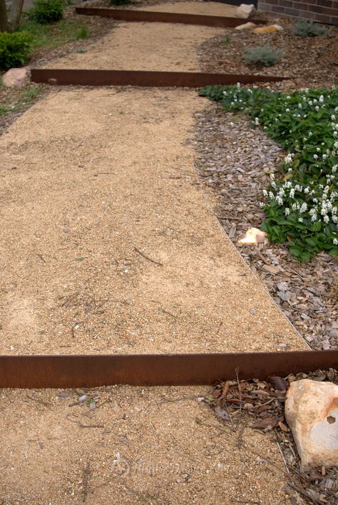 Deco gold crushed decomposed gravel pathway Tuscan Toppings Gravel, Crushed Limestone Pathway, Sewer Cover Landscaping, Edging For Gravel Pathway, Sloped Pathway, Garden Pathway Ideas, Patio Gardening, Gravel Pathway, Pathway Ideas