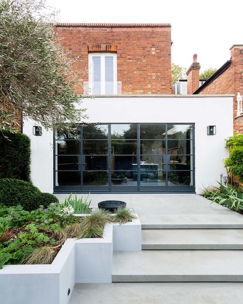 Our design team reconfigured the ground floor and added a small rear and side extension to open the space for a huge kitchen and dining area, with a bank of Crittall windows leading to the garden #interiors #architecture #construction https://zulufish.co.uk/projects/abinger-road/ Rear Extension Ideas, Crittall Windows, Chiswick London, Crittal Windows, Kitchen And Dining Area, Side Extension, Huge Kitchen, House Extension Design, Rear Extension