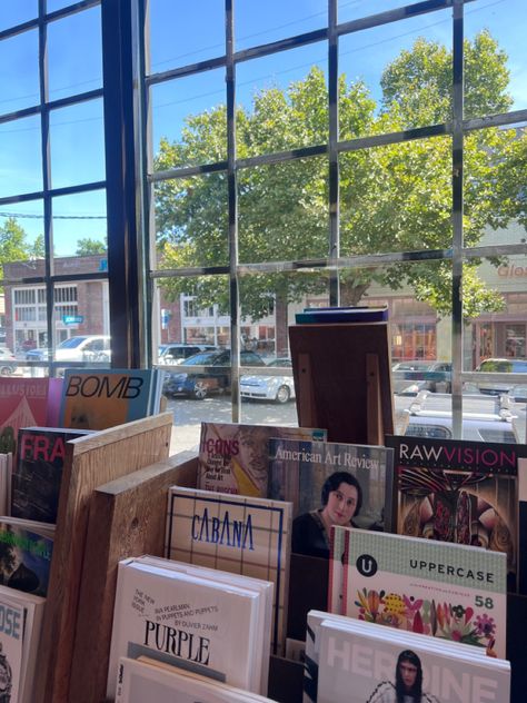 A small glimps of the Eliot Bay Co. Bookstore in Seattle Faqir Chand Bookstore Aesthetic, City Bookstore Aesthetic, Bookshop Aesthetic Girl, Seattle Bookstore Aesthetic, Rainy Bookstore Aesthetic, Upper Case, Reading Recommendations, Bookstore, American Art