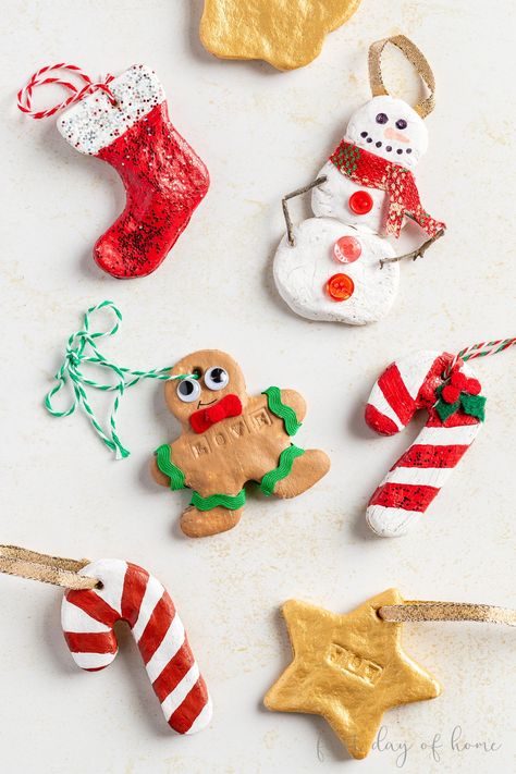 This easy recipe for salt dough ornaments is the perfect Christmas craft for kids! You need only 3 ingredients, and you can customize your DIY ornaments with paint, glitter, handprints, thumbprints, stamps and more. Choose to bake the dough or let it air dry (no-bake option). You'll want to make salt dough ornaments for every holiday! #saltdoughornaments #saltdough #kidscrafts #christmascrafts #firstdayofhome Salt Dough Xmas Ornaments, Toddler Diy Ornaments Christmas, Saltdough Tree Decorations Kids, Air Dry Salt Dough Recipe, Salt Dough Tree Ornaments, Cornstarch Dough Ornaments, Homemade Ornaments For Kids, Homemade Ornaments Kids, Salt Dough Ornaments For Kids