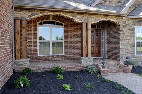 Rustic columns and red brick Farmhouse Reno, Front Porch Stone, Brick Ranch Houses, Red Brick House Exterior, Brick House Designs, Southern Farmhouse, Traditional Porch, Cedar Posts, Outdoor Renovation