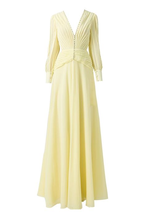 Long sleeves, V-neck, elegant bow with delicate pearls, figure-flattering fitted waist, pleated skirt, fully lined, and a discrete back zipper. - Long sleeves - V-neck - Bowtie with pearl line - Fitted waist- Pleated skirt - Lined - Back zipper Composition: Chiffon (30% silk, 70% polyester), Lining: Soft silk (60% cotton, 40% silk)Shoulder to Hemline: 155 cm Model wears size S Fall Gowns, Royal Outfit, Yellow Floor, White Fits, Knitwear Outfit, Happy Clothes, Floor Length Dress, Full Skirts, Dresses By Length