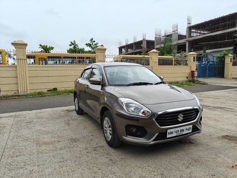 Explore the 2018 Maruti Suzuki Swift Dzire VDI (O) in Vasai East, Mumbai. Diesel, manual, 1st owner, 81,744 km, golden color, comprehensive insurance valid until 11-Sep-2024. Priced at ₹550,000. Visit Sahani Autozone or WhatsApp at 7028956610 for details. Suzuki Dzire, Maruti Suzuki Swift, Swift Dzire, Maruti Suzuki Cars, Suzuki Cars, Maruti Suzuki, Suzuki Swift, Golden Color, Mumbai