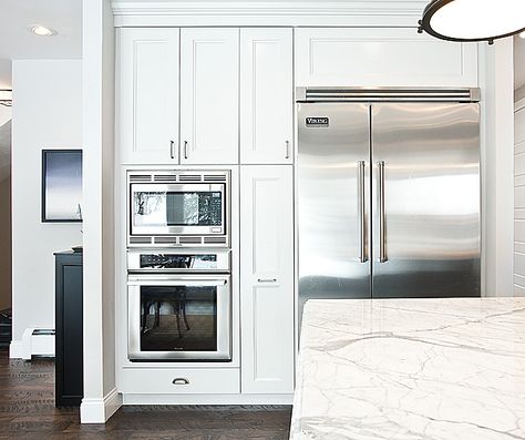 Kitchen features floor to ceiling cabinets encasing Viking French Door Refrigerator, microwave oven and convection oven. Viking Fridge, To Ceiling Cabinets, Viking Refrigerator, Ceiling Cabinets, Fridge Design, Double Electric Wall Oven, Floor To Ceiling Cabinets, Kitchen Wall Art Printables, Oven Design