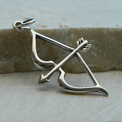 This Sterling Silver Bow and Arrow Charm is as popular as the Hunger Games. Visit http://www.ninadesigns.com/bali_bead_shop/sterling_silver_bow_and_arrow_charm/a1182/details $12.20 Retail, wholesale pricing on website. Bow And Arrow Jewelry, Silver Bow And Arrow, Sagittarius Sun, Scorpio Rising, Arrow Jewelry, Silver Pendant Lighting, Bow Arrow, Arrow Ring, Wholesale Silver Jewelry