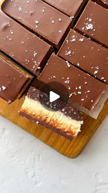 amara • melbourne food + recipes on Instagram: "This bounty slice is truly a slice of coconut heaven!! As a non-bounty lover (originally), I think I’ve officially been converted 🫢🥥🌴

RECIPE
Ingredients:
Base 
- 1/2c almond meal
- 1/2c roasted nuts 
- 1/4c cacao or cocoa powder 
- 1c pitted dates (soaked in boiling water 10 mins and drained) 
- Pinch of salt 

Middle 
- 1c raw cashews (soaked in boiling water for 15 mins and drained) 
- 1c dessicated coconut 
- 2/3c @naturescharm coconut whipping cream 
- 1/3c maple syrup 
- 1/4c coconut oil (melted)
- 1 tsp vanilla extract 

Top
- 100g chocolate chips 
- 1/3c @naturescharm coconut whipping cream 

Method:
1. Combine the ingredients for the base into a food processor and transfer into a lined tray. Press down firmly. Place in the fridge Bounty Slice, Dessicated Coconut, Pitted Dates, Almond Chocolate, Almond Meal, Melbourne Food, Roasted Nuts, Raw Cashews, Whipping Cream