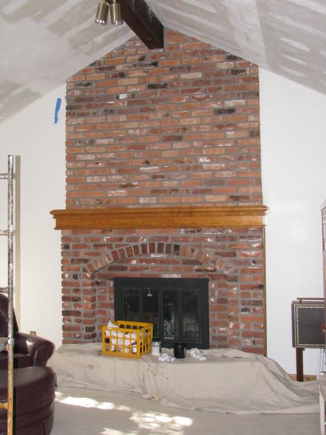 (Fireplace BEFORE) I will start by saying I lovvvvvvvvvvve brick fireplaces. And I love floor to ceiling brick fireplaces even more.But, I don't love the " Floor To Ceiling Brick Fireplace, Brick Fireplace Remodel, Floor To Ceiling Fireplace, Airstone Fireplace, Brick Fireplace Wall, Ceiling Fireplace, Red Brick Fireplaces, Porch Styles, Brick Fireplace Makeover