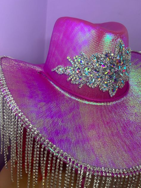 Handmade fun festival style cowgirl hat Gold tear drop sequin dangle trim, with gold embellished stars on an iridescent pink cowboy hat Great for festivals, concerts, parties One Size fits all - Adults Cowboy hat / cowgirl hat / embellished hat / white hat / fluffy hat / fur hat / bridal hat / Bride Hat Boxed delivery via courier Pink Cowgirl Rave Outfit, Fluffy Cowboy Hat, Cowgirl Rave Outfit, Rave Party Outfit, Cowgirl Disco, Cosmic Cowgirl, Fluffy Hat, Pink Cowboy Hat, Pink Cowboy