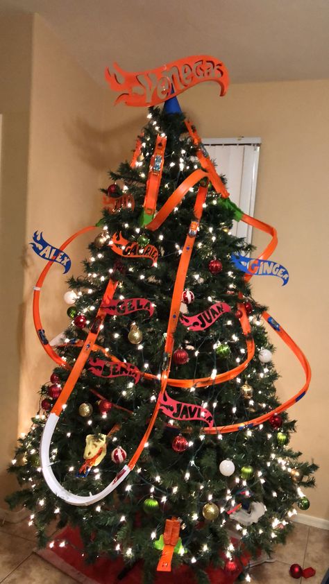 Hot Wheels Tree Christmas, Sport Themed Christmas Tree, Hot Wheel Christmas Tree, Hotwheels Christmas Tree Ideas, Monster Jam Christmas Tree, Hot Wheels Christmas Tree Ideas, Hot Wheels Gift Ideas, Cars Christmas Tree, Christmas Tree Themes Unique