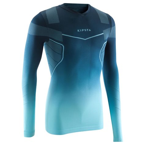 The base layer, also known as the inner layer, helps: . absorb perspiration and transfer it to the outside. The skin stays dry, keeping the body from becoming chilled. Retaining body heat more effectively, particularly when the product is close-fitting. . provide an additional barrier against bad weather . keep your soccer shirt dry, even when you're running hard. Playing with a technical base layer allows you to keep playing for longer. | Kipsta Adult Breathable Long Sleeve Base Layer Keepdry 5 Basketball Clothes, Kids Soccer, Mens Workout Clothes, Basketball Clothing, Soccer Shirts, Hiking Pants, Sports Gear, Sports Equipment, Sports Shoes