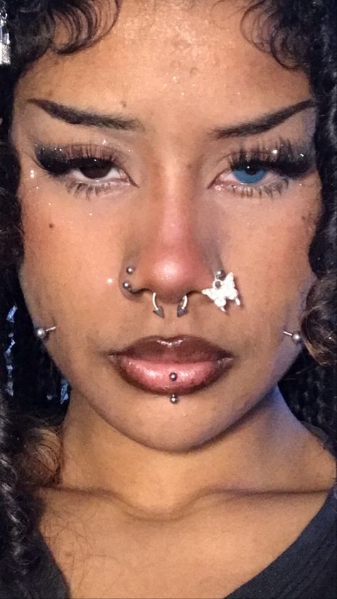 Spike bridge piercing,eyebrow piercing ,nose ,piercing ,vertical labret. heterochromia Vertical Labret And Nose Piercing, Labret Piercing Black Woman, Double Vertical Labret Piercing, Septum And Vertical Labret, Vertical Labret Piercing Black Women, Top Lip Piercing, Vertical Labret Jewelry, Piercing Vertical Labret, Spiderbite Piercings