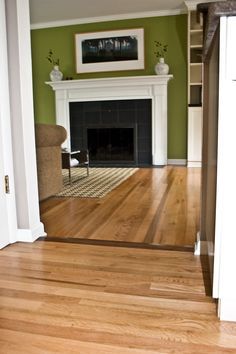 room transition from light gray floor to wood - Google Search Hardwood Transition, Room Transition, Floor Transitions, Floor Transition, Light Oak Floors, Transition Flooring, Hallway To Bedrooms, Wood Floor Design, Gray Floor