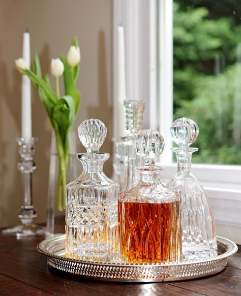 Use those crystal decanters you received for your wedding, put them on a silver tray and set on a rustic farmhouse table for a bit of sparkle! Decanter Display, Bandeja Bar, Gold Bar Cart, Glamour Decor, Rustic Farmhouse Table, Bar Tray, Bar Cart Styling, Drinks Tray, 카페 인테리어 디자인