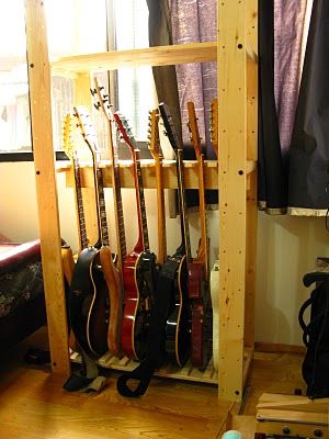 Materials: Gorm Description: This guitar shelf took me about 3 hours to make from the shelves I bought in IKEA. The main step is making the original shelf into the way that you can see in the picture above. And there’s a important point on this guitar shelf that’s how it was done completely. To [&hellip Guitar Organization, Guitar Craft, Guitar Shelf, Guitar Storage, Props Storage, Guitar Display, Home Music Rooms, Guitar Rack, Ikea Finds