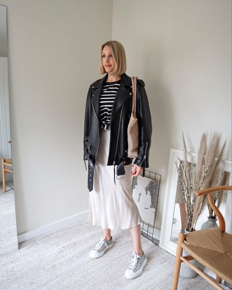 6/10 ways to wear a leather jacket A satin slip skirt is a timeless staple for any capsule wardrobe. I’ve had this Next one going on 5 years! This year I’m looking to add a new satin skirt to my own closet so I’ll link some of my faves below! (T-shirt old H&M but I’ve linked some similar that are new in stock) My beloved Acne Studios oversized Myrtle leather jacket is back in stock in all sizes online! A leather jacket is such an investment piece and can be worn with all your wardrobe staple Slip Skirt Leather Jacket Outfit, Satin Slip Skirt Outfit, Slip Skirt Outfit, 10 Ways To Wear, Satin Slip Skirt, Skirt Winter, Maxi Skirt Outfits, Leather Jacket Outfits, Winter Skirt