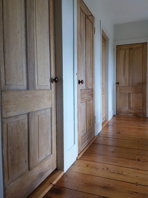 Rustic Wooden Doors Interior, Light Wood Doors With White Trim, Wooden Doors Hallway, Natural Wood Inside Doors, Vintage Doors Interior Decorating Ideas, Wood Doors And Floors, Wooden Hallway Doors, Wood Trim And White Doors, Reclaimed Wood Interior Doors