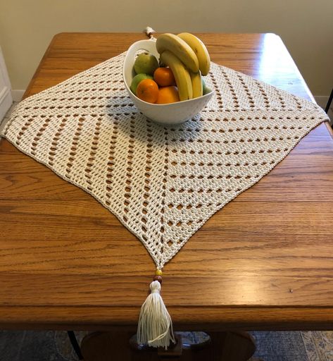 This square table topper can serve as a base for a beautiful flower arrangement , bowl of fruit or plant, but it will also dress up a table on it’s own. The pattern is a geometric swirl that is happy playing all by itself. Hand crocheted with 100% cotton in a soft ivory color. It measures Hostess Gifts Bridal, Crochet Cup Coaster, Table Decor Farmhouse, Crochet Table Topper, Contemporary Crochet, Coaster Projects, Neutral Baby Gifts, Gender Neutral Baby Gifts, Crochet Patterns Free Beginner